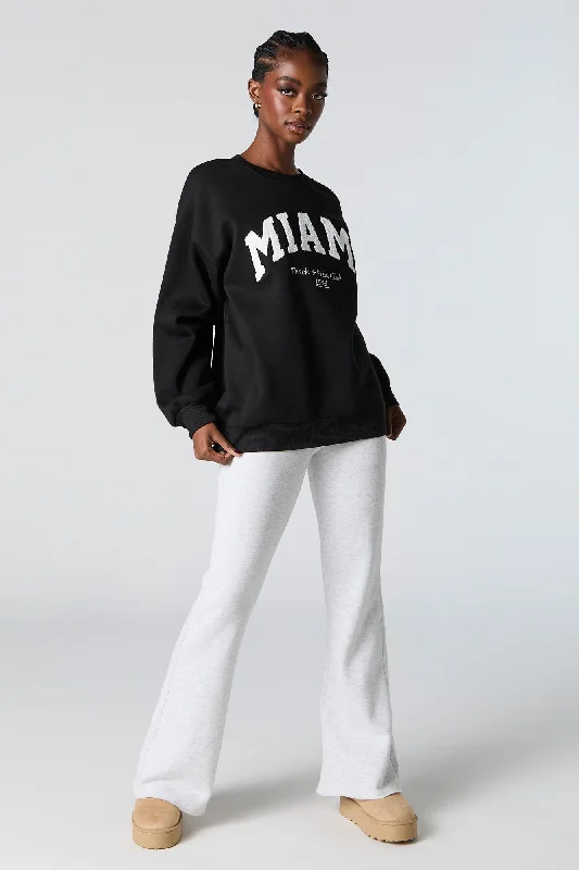 0706-39071701-oversized-destination-chenille-embroidered-fleece-sweatshirt