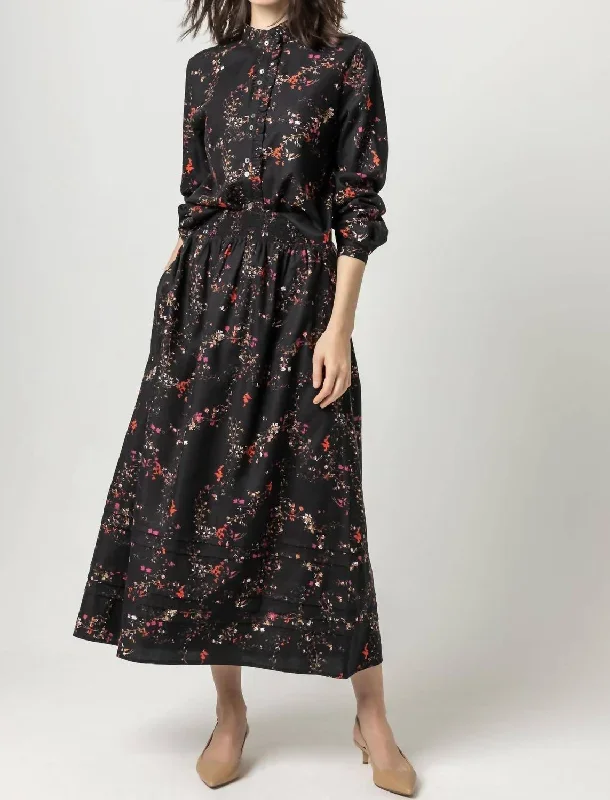 printed-woven-pleated-hem-skirt-in-black-floral