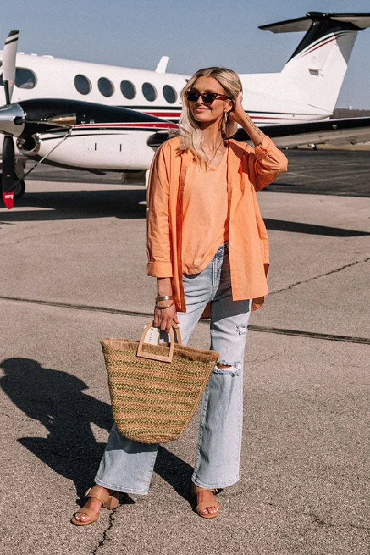 sending-good-luck-button-up-top-in-orange